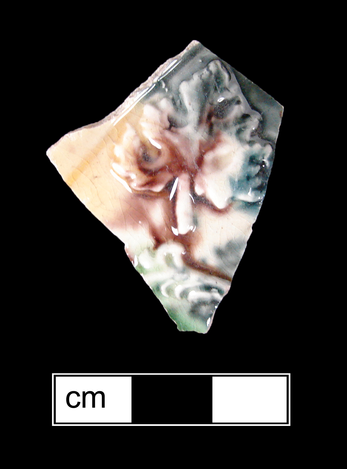 Image of clouded or tortoiseshell glazed fragment.