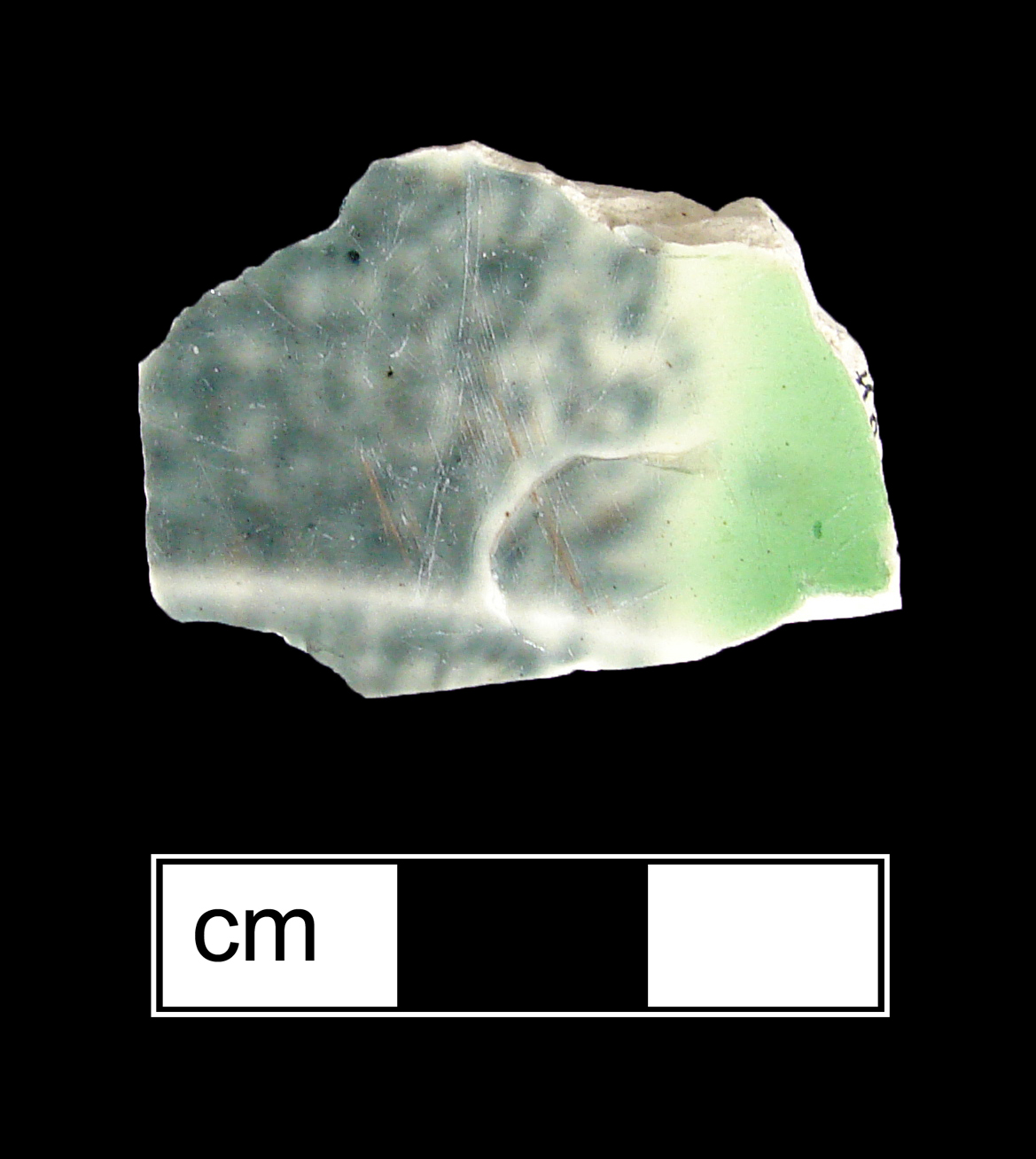 Image of clouded or tortoiseshell glazed fragment.