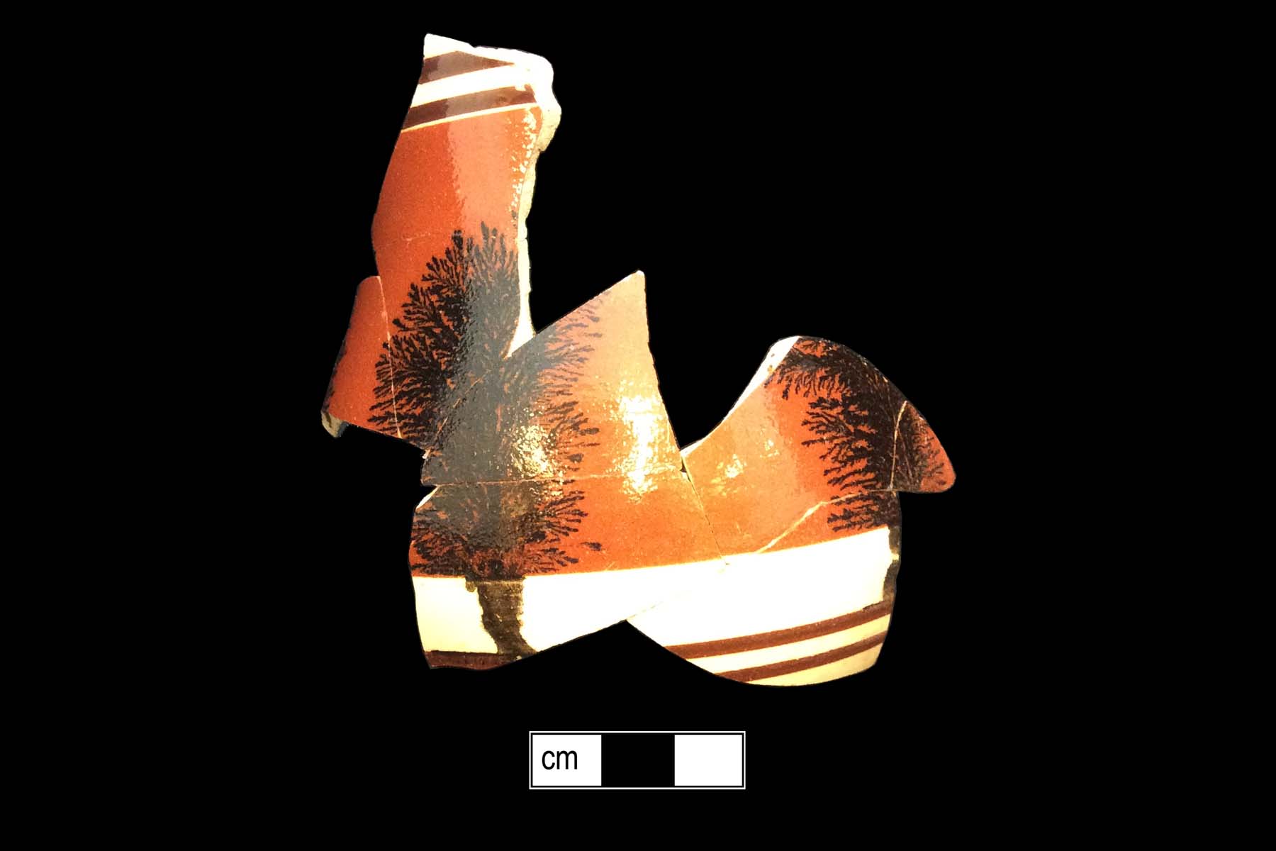 Image of dipped earthenware fragment.