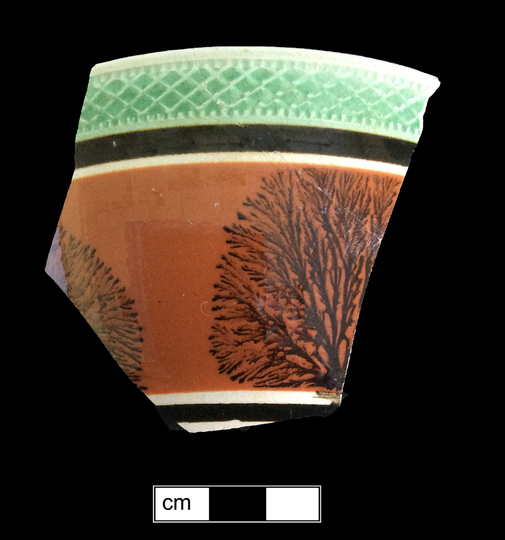 Image of dipped earthenware fragment.