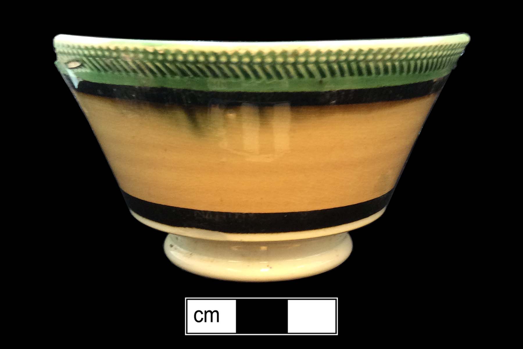 Image of dipped earthenware fragment.