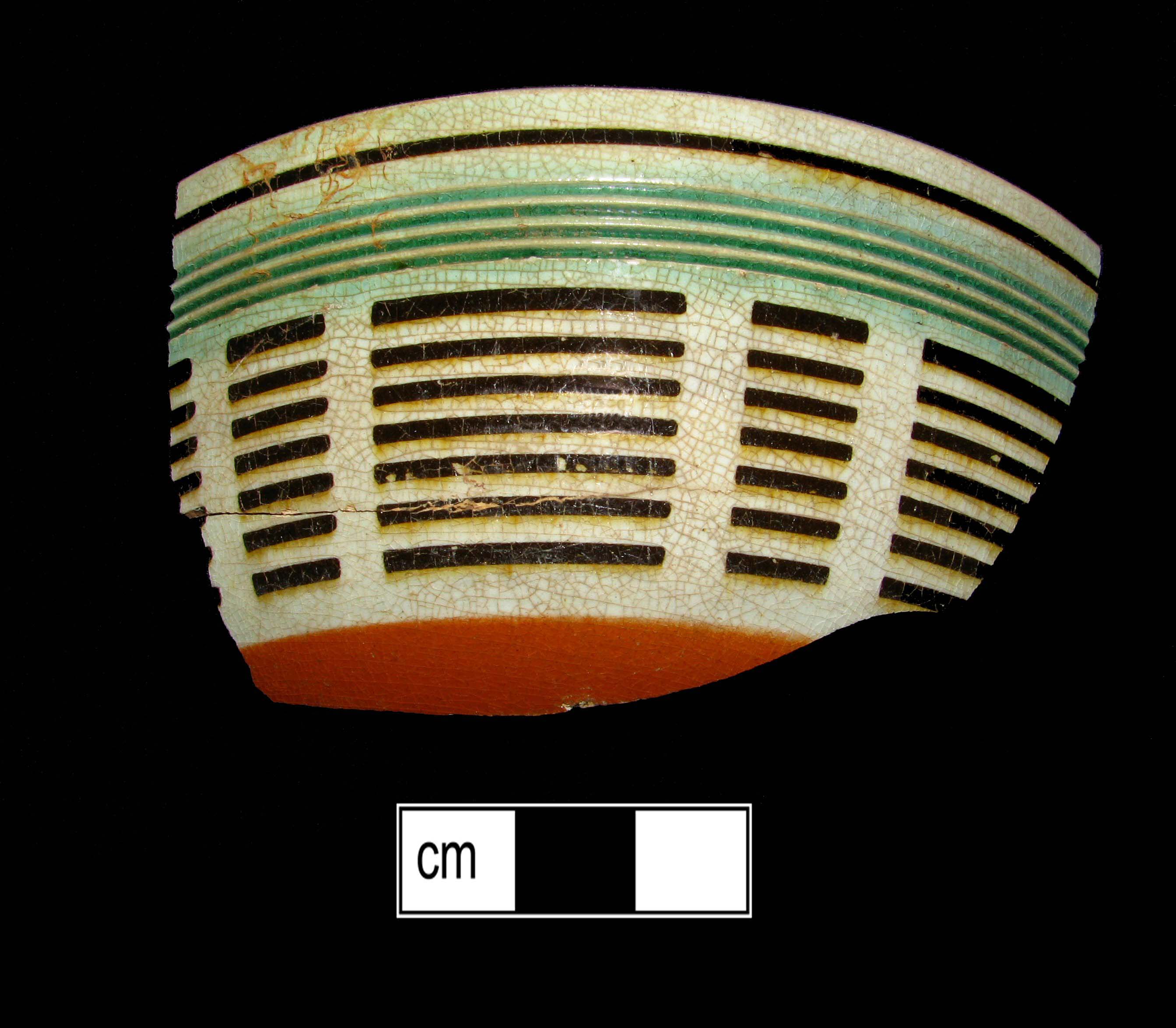 Image of dipped earthenware fragment.