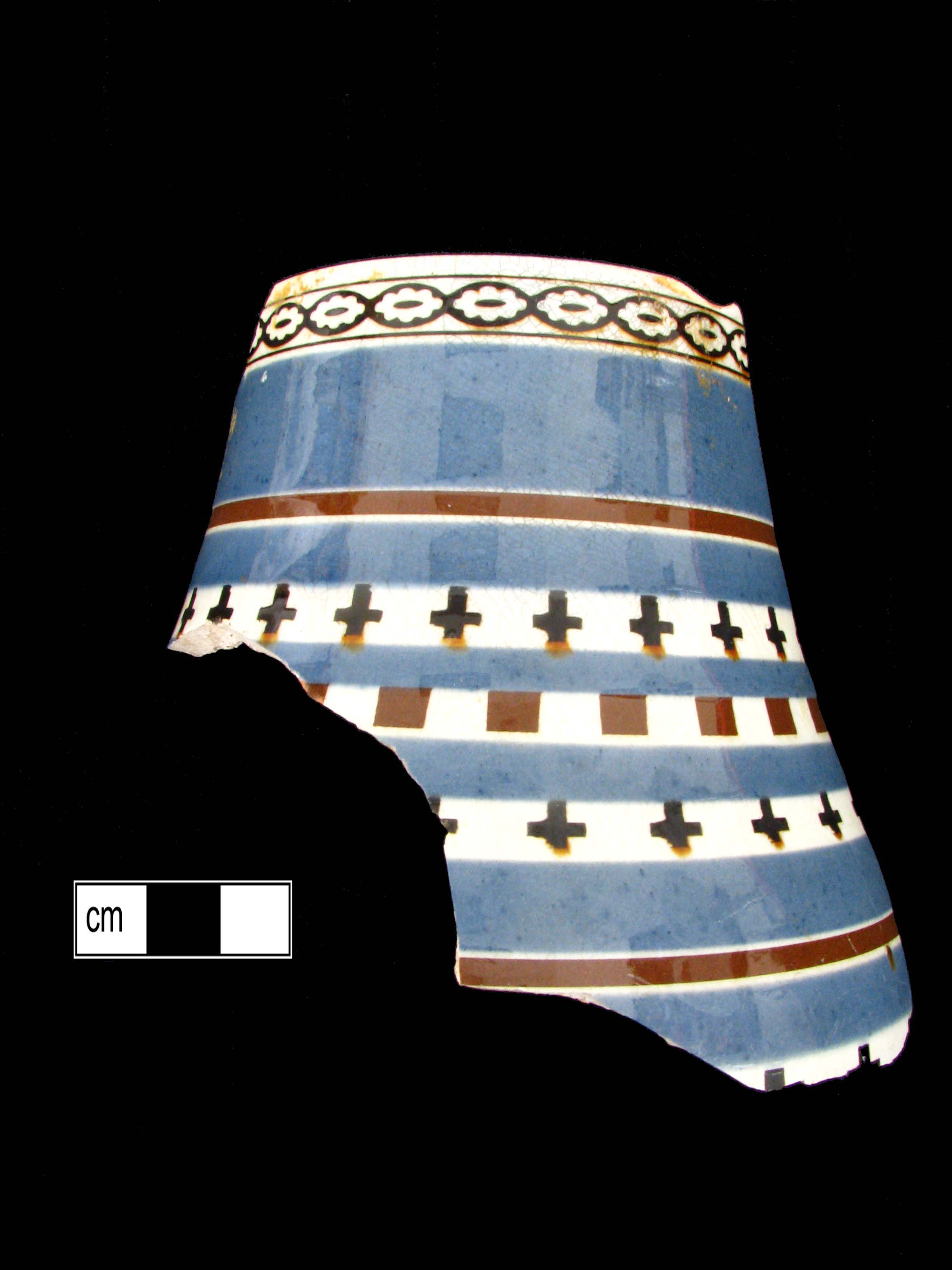 Image of dipped earthenware fragment.