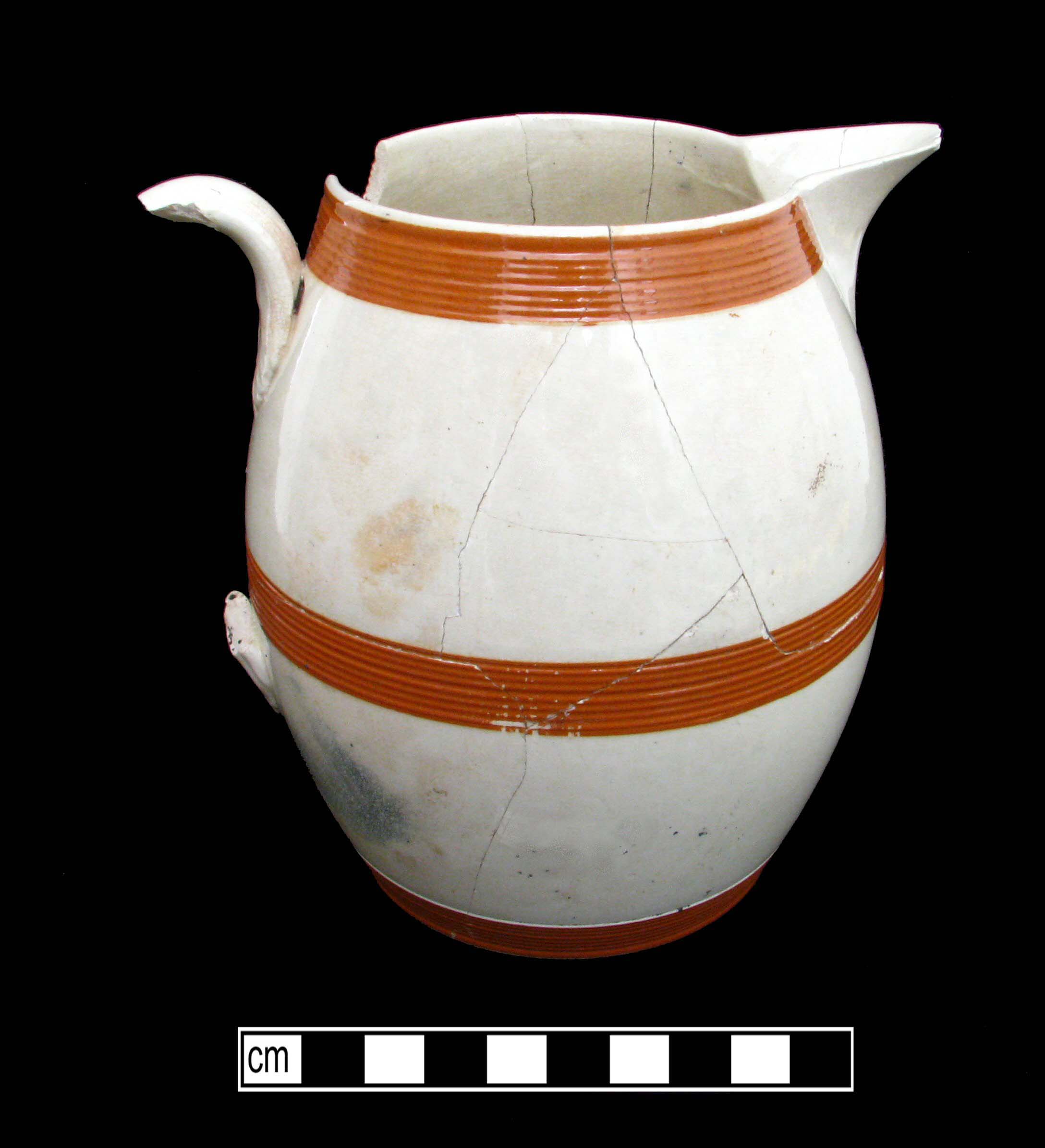 Image of dipped earthenware fragment.