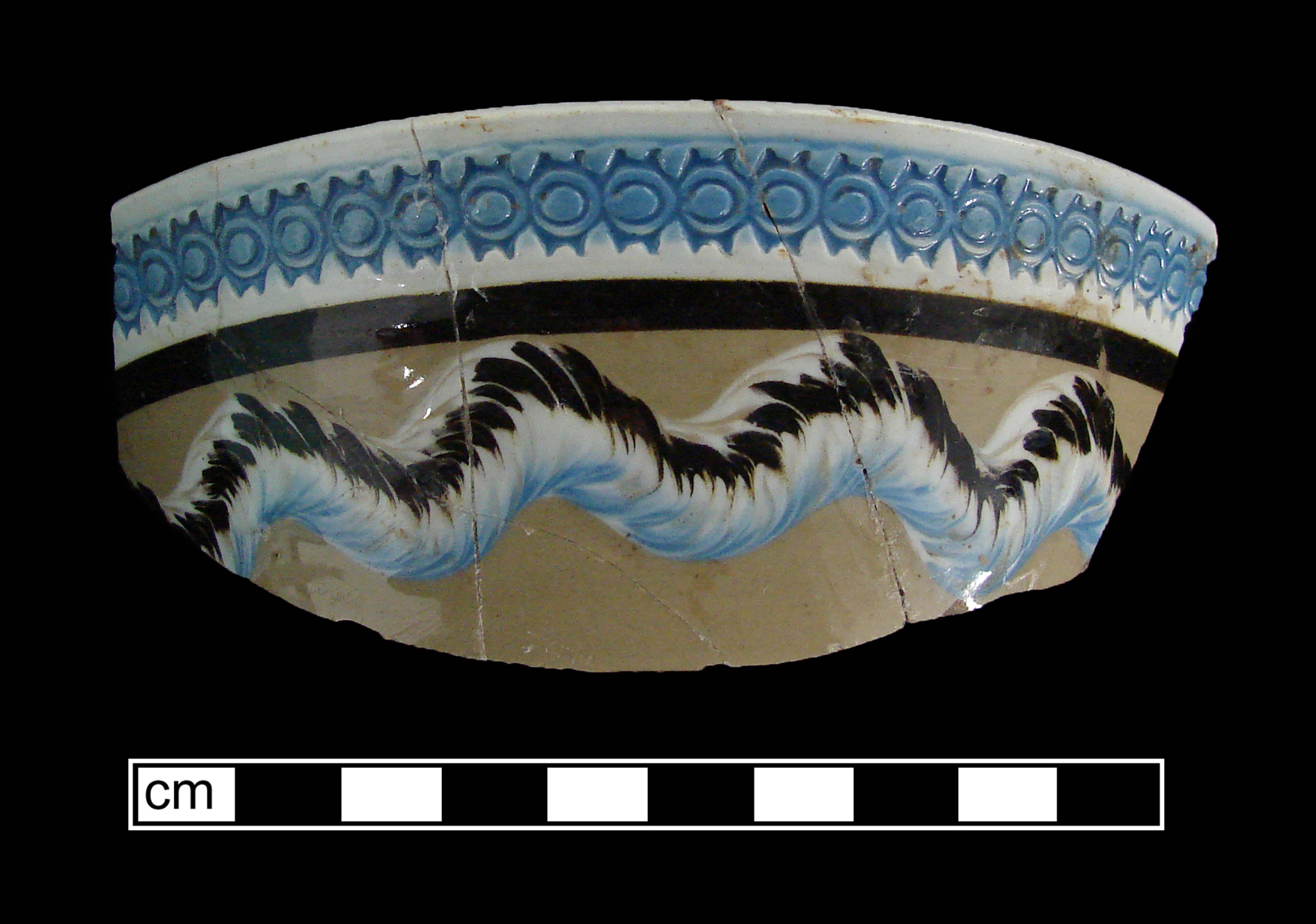 Image of dipped earthenware fragment.