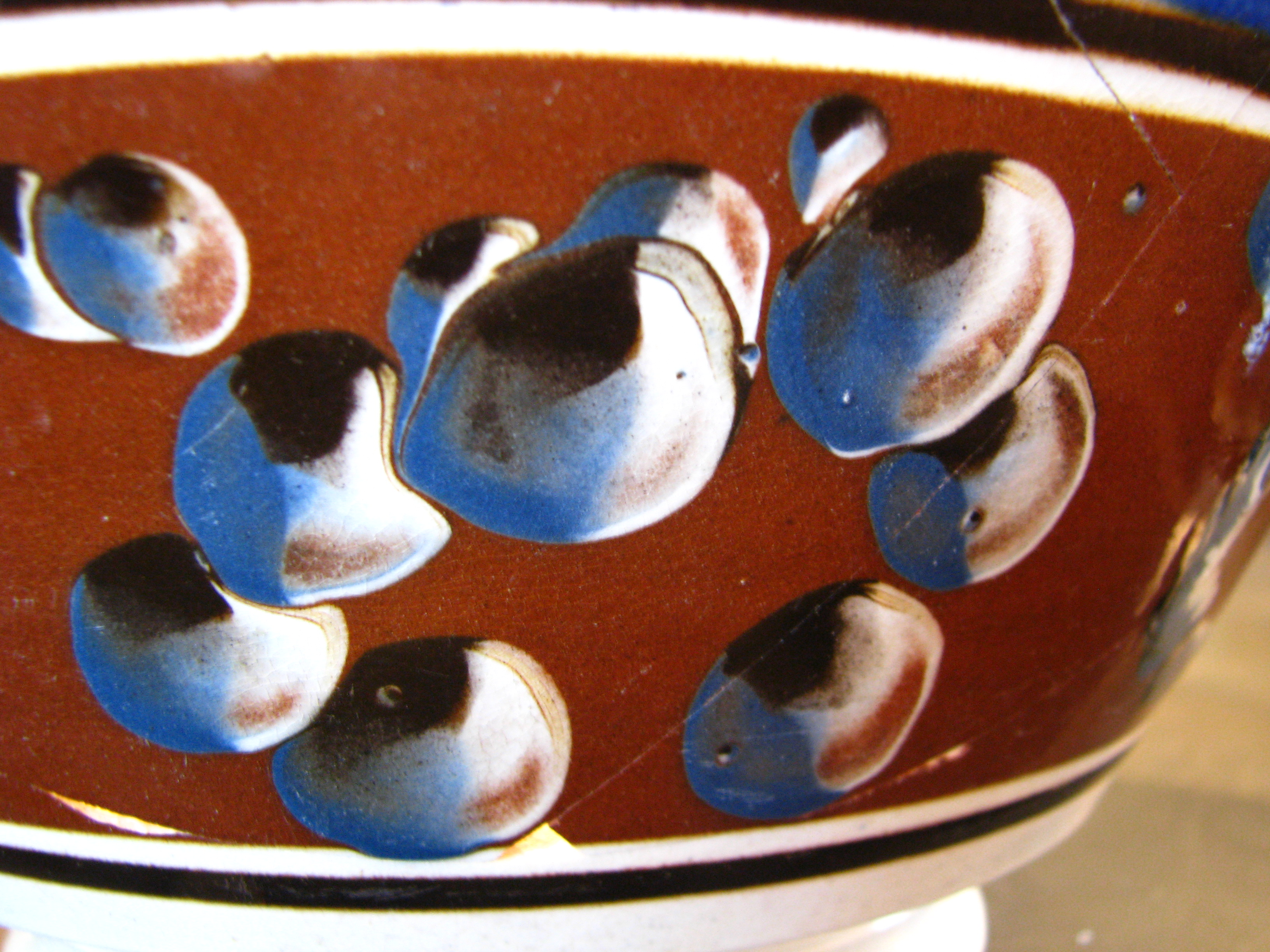 Image of dipped earthenware fragment.
