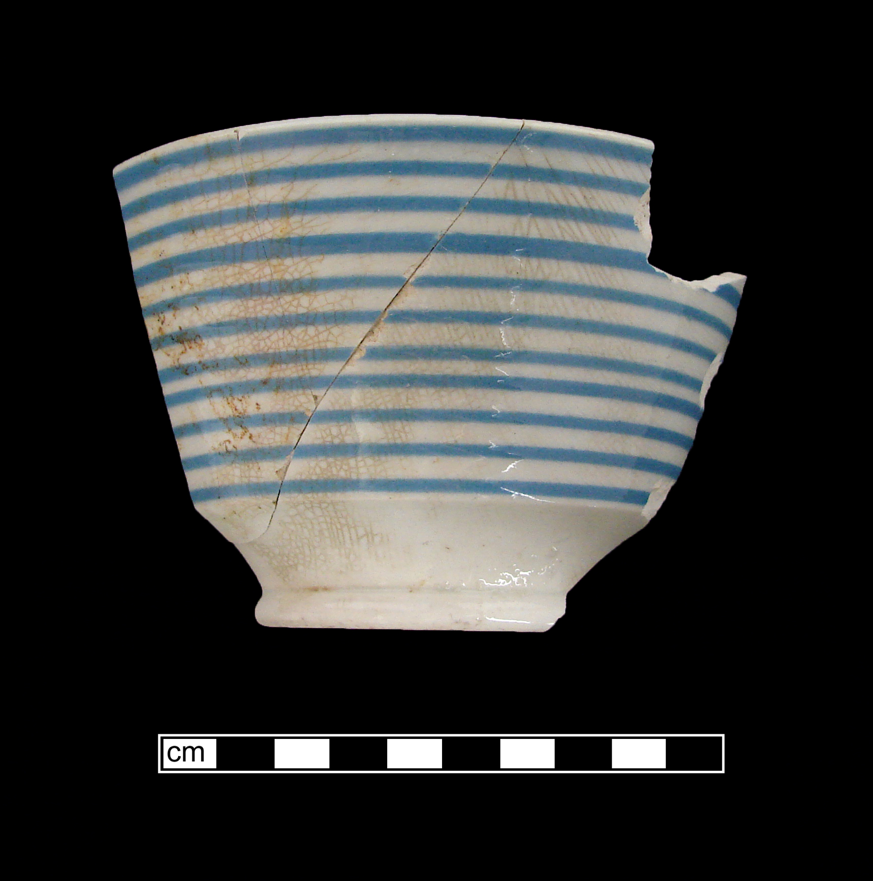 Image of dipped earthenware fragment.