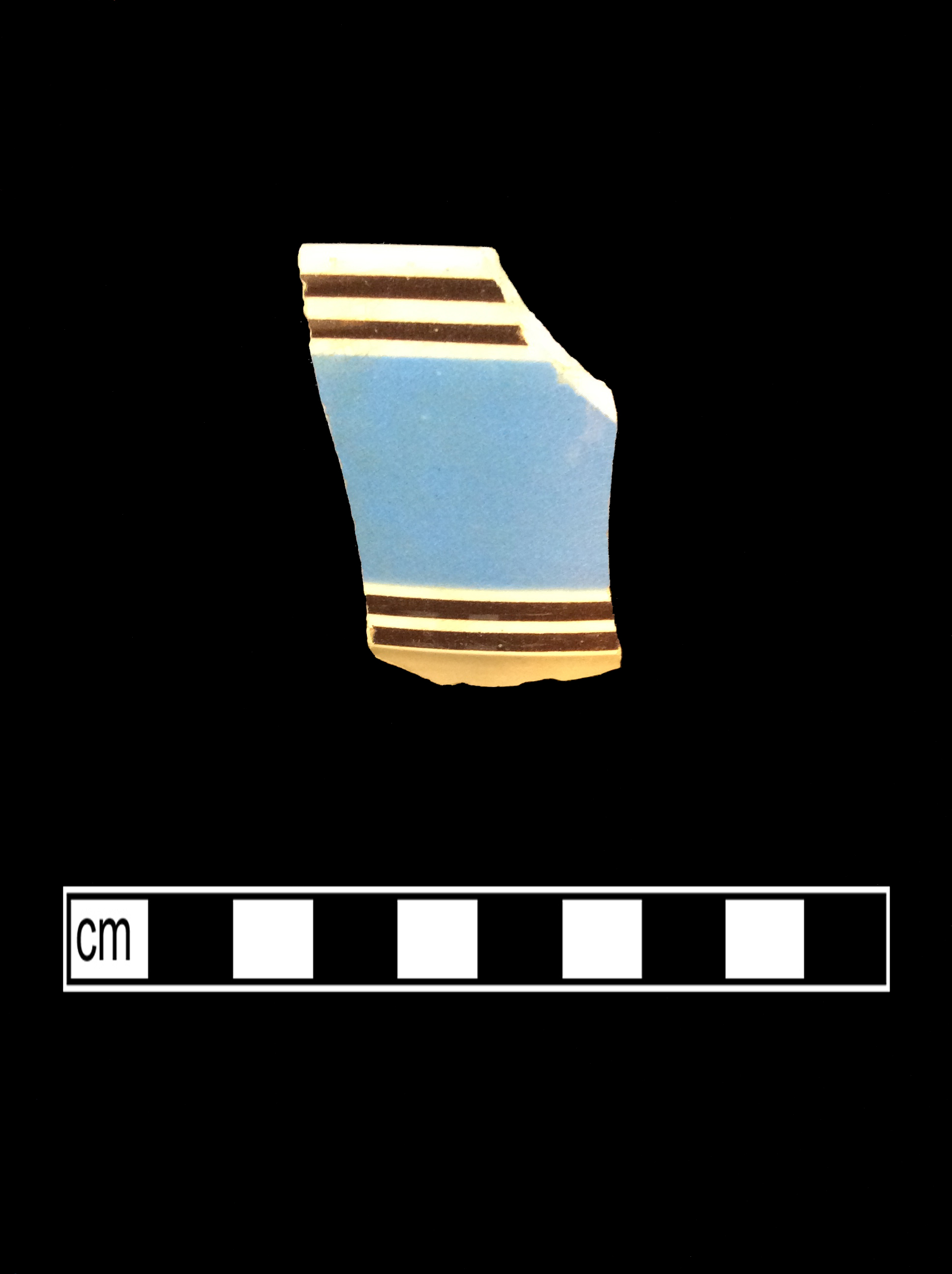 Image of dipped earthenware fragment.