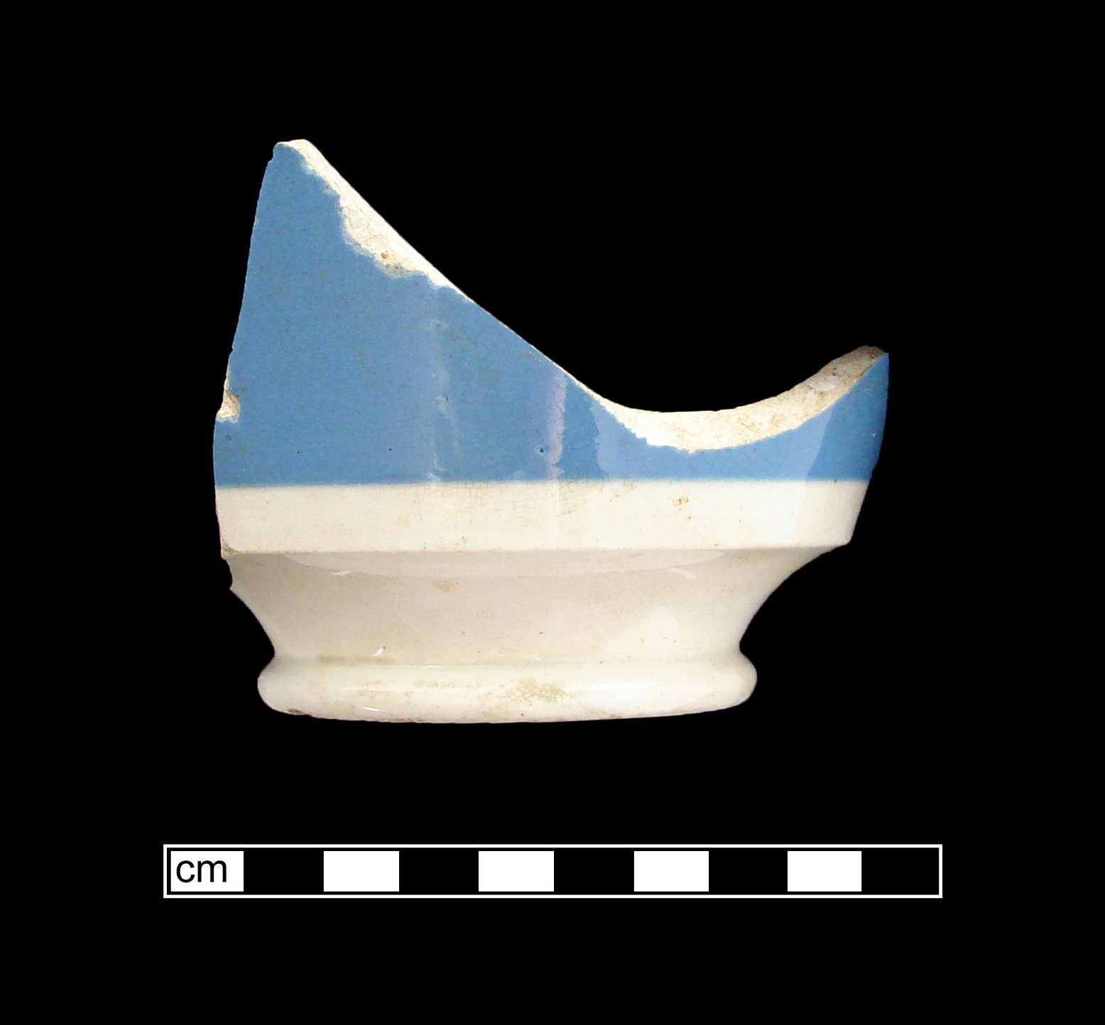 Image of dipped earthenware fragment.