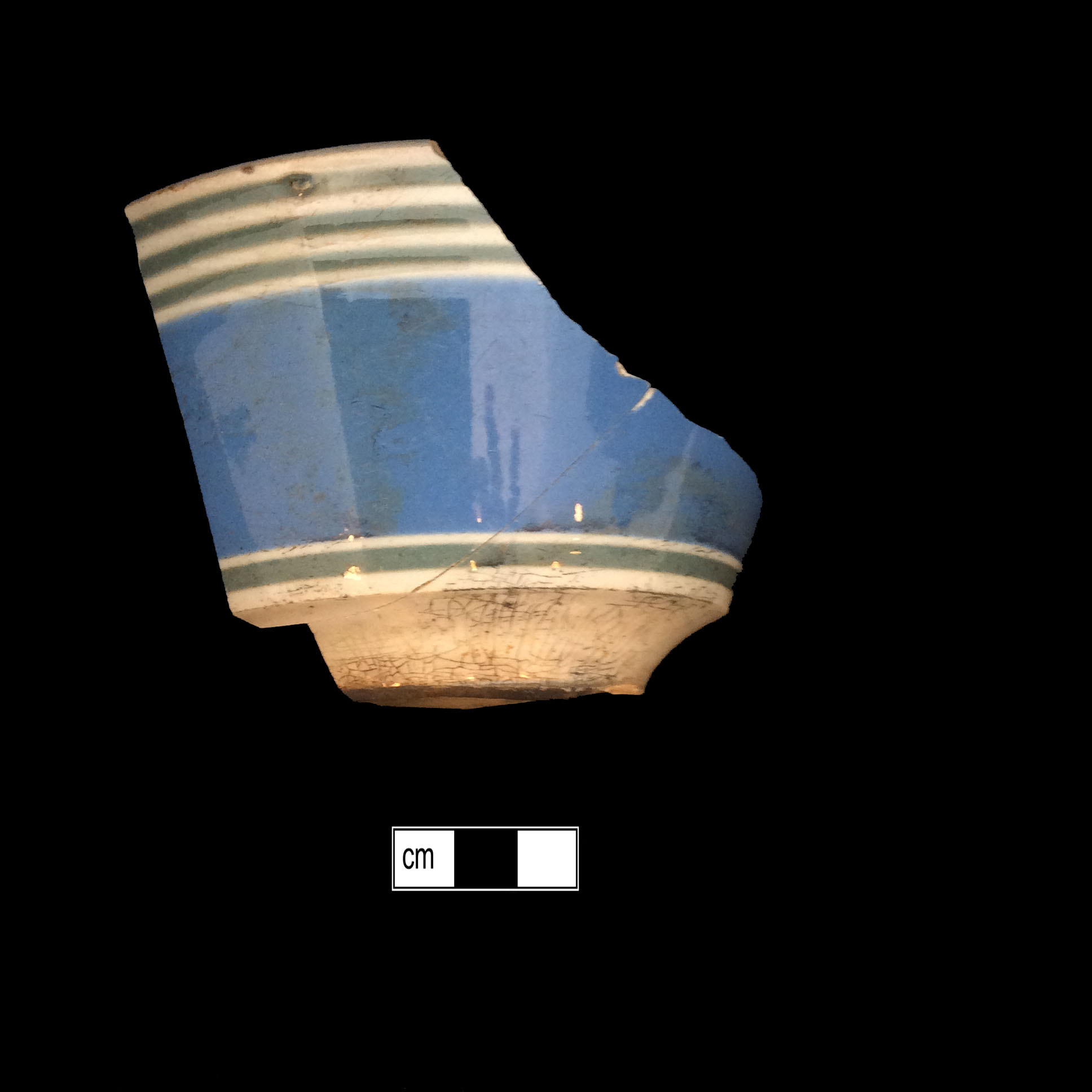 Image of dipped earthenware fragment.