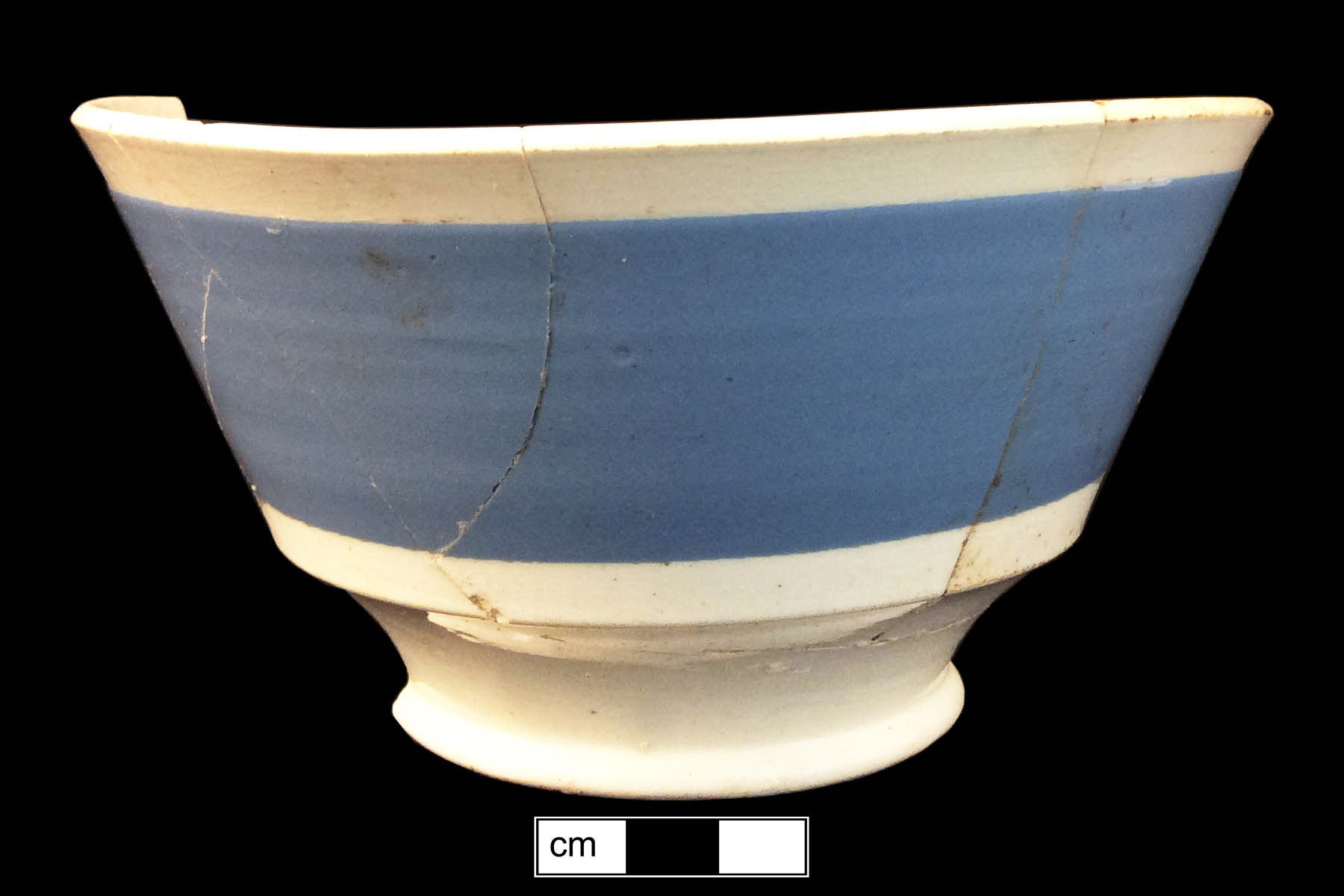 Image of dipped earthenware fragment.