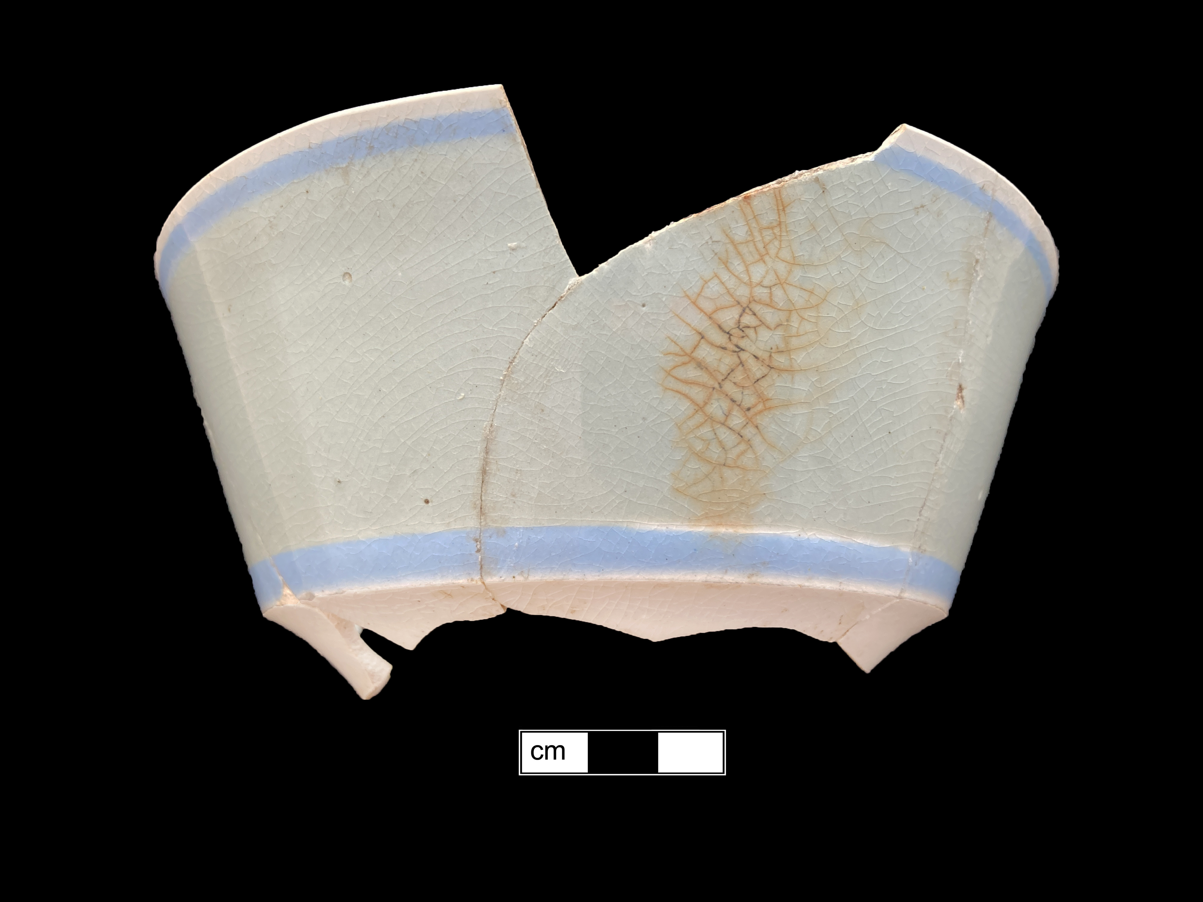 Image of dipped earthenware fragment.