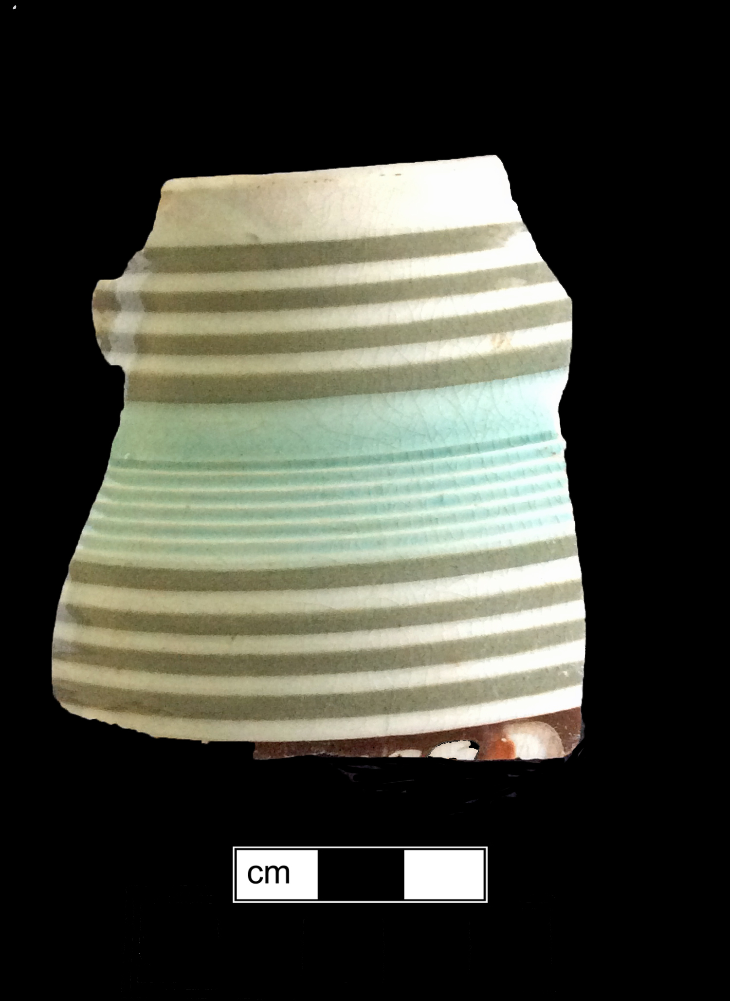 Image of dipped earthenware fragment.