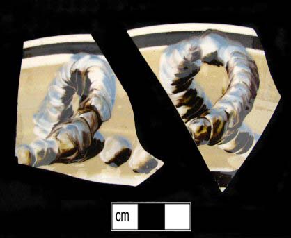 Image of dipped earthenware fragment.