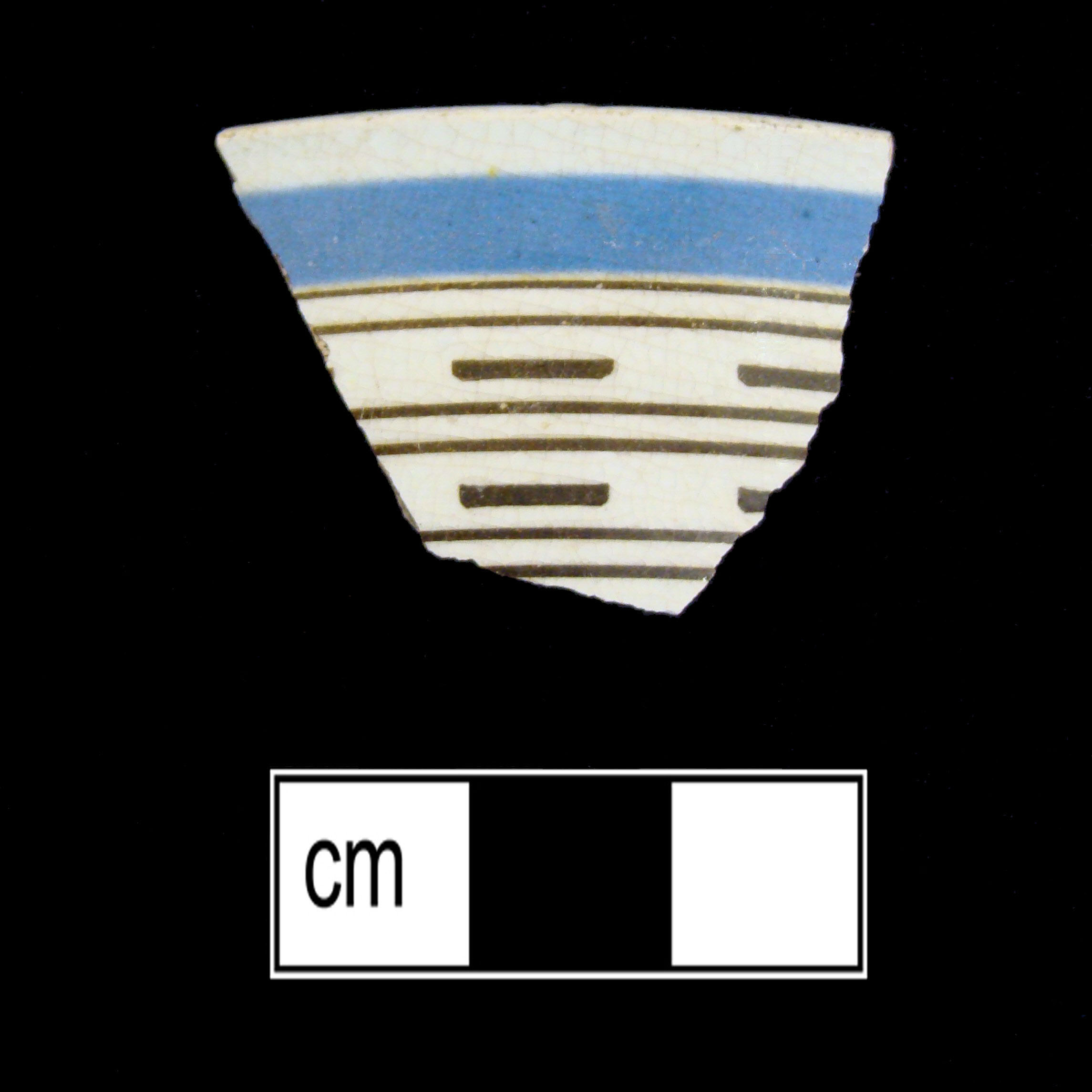 Image of dipped earthenware fragment.