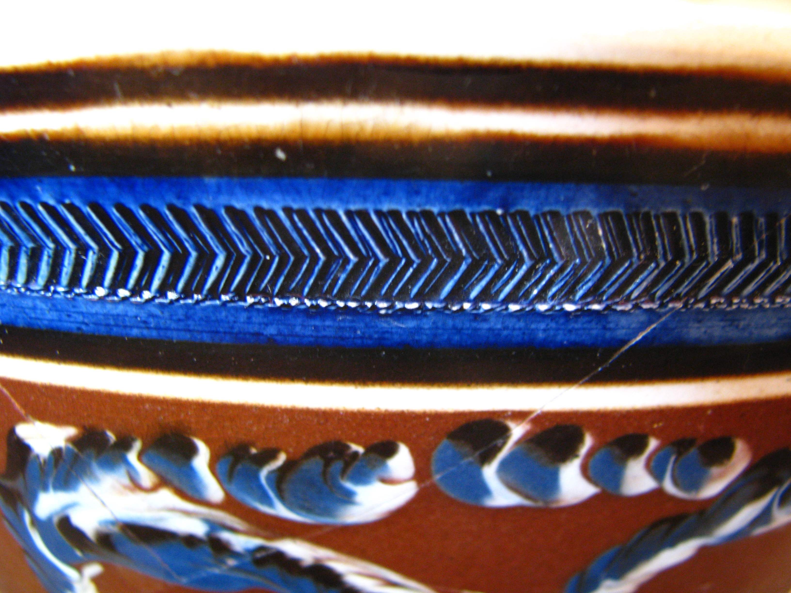 Image of dipped earthenware fragment.