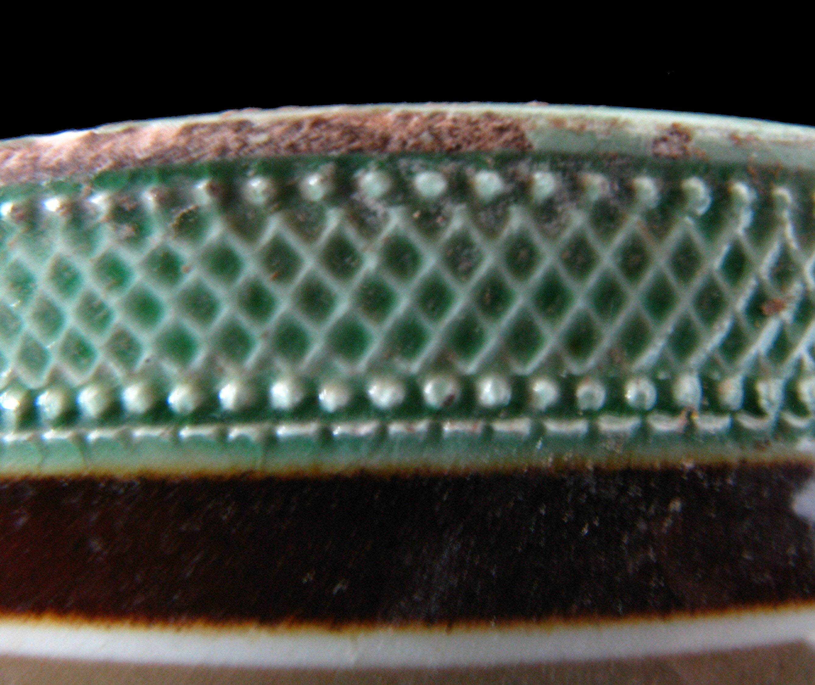 Image of dipped earthenware fragment.