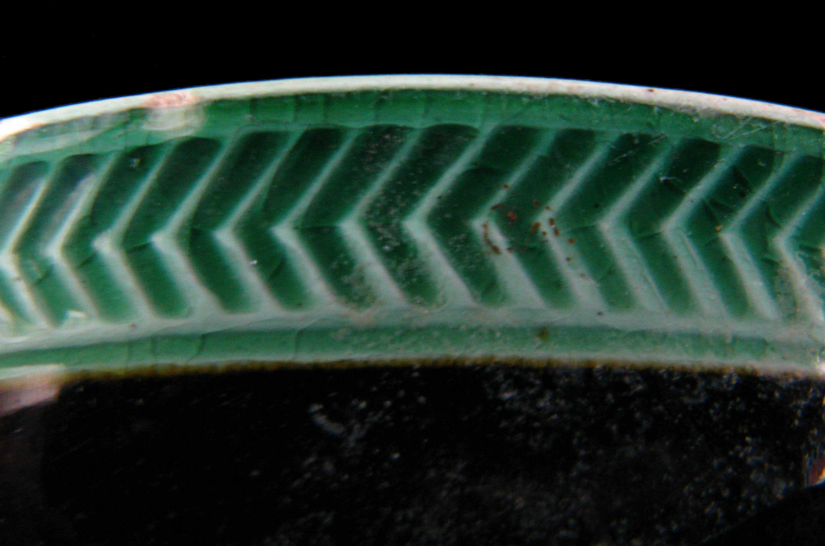 Image of dipped earthenware fragment.