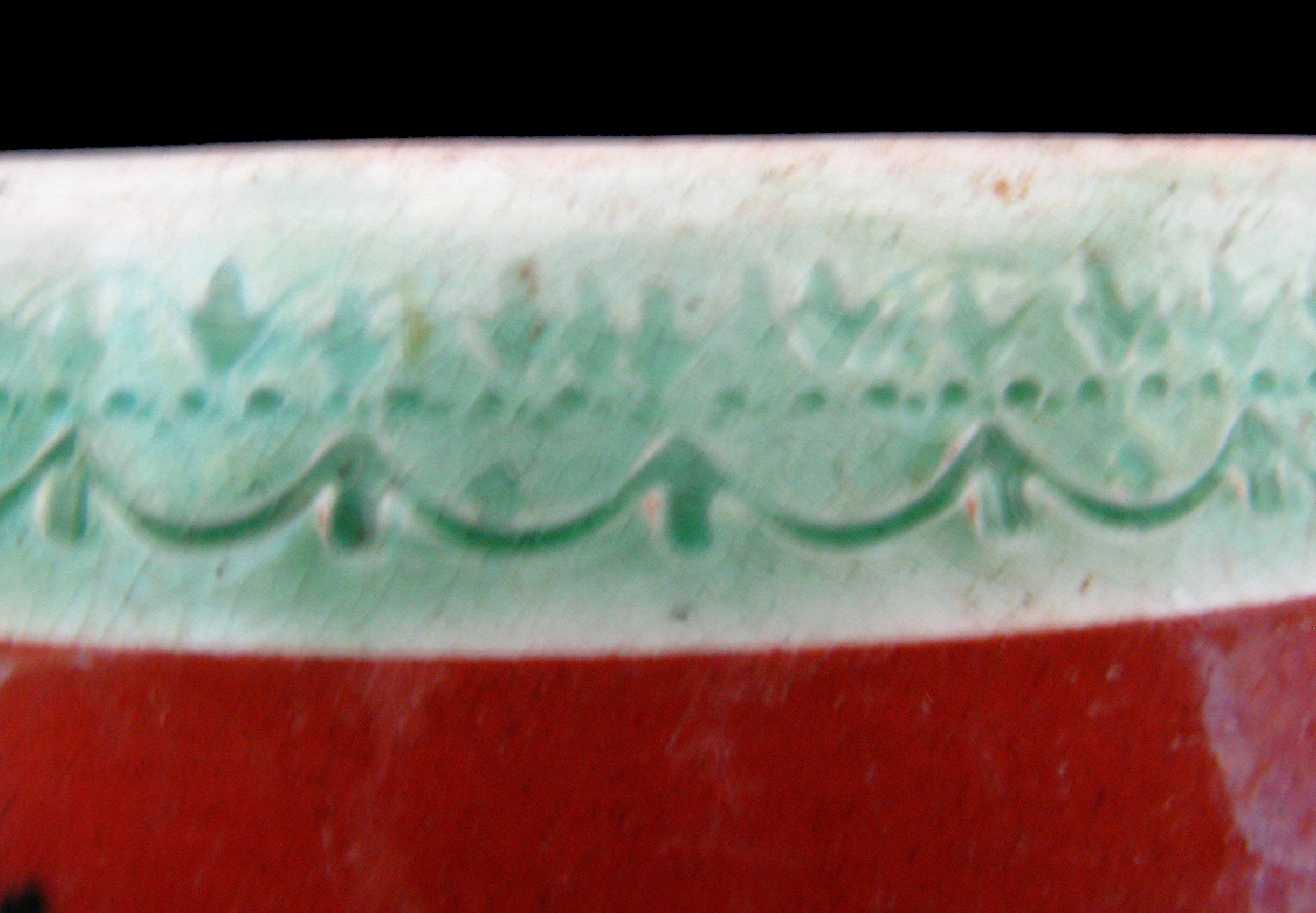 Image of dipped earthenware fragment.