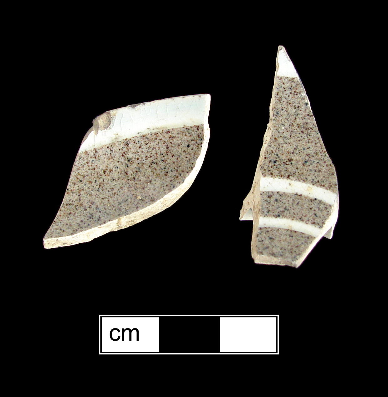 Image of dipped earthenware fragment.