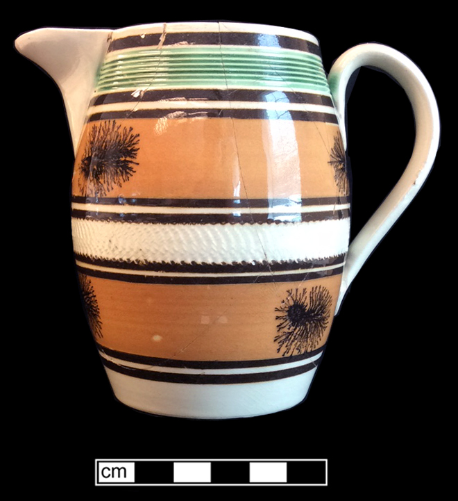 Image of dipped earthenware fragment.