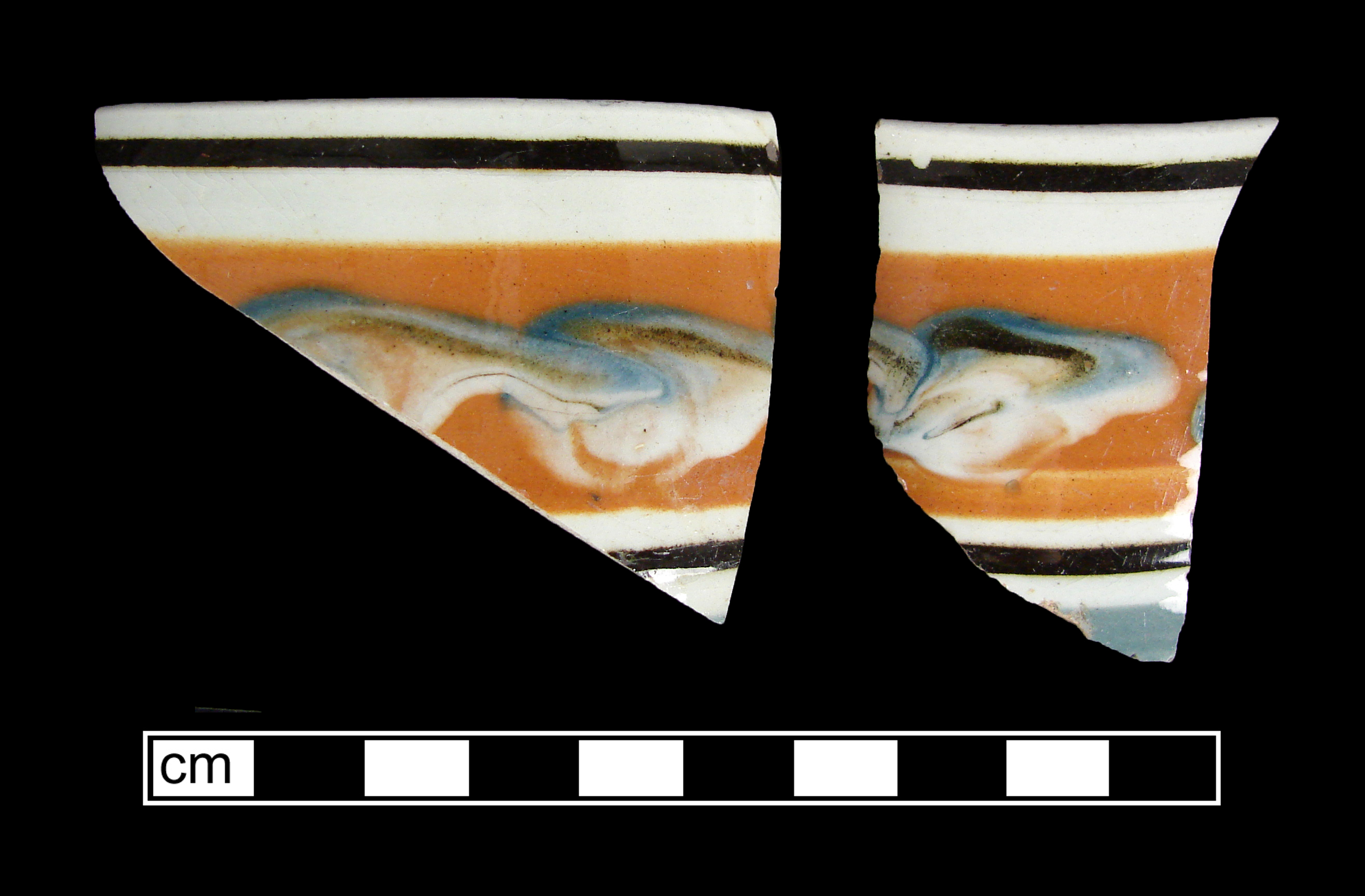 Image of dipped earthenware fragment.