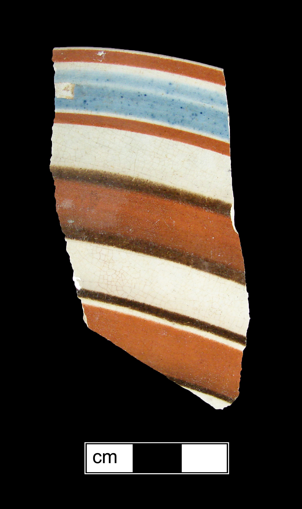 Image of dipped earthenware fragment.