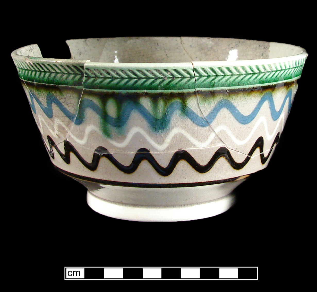 Image of dipped earthenware fragment.