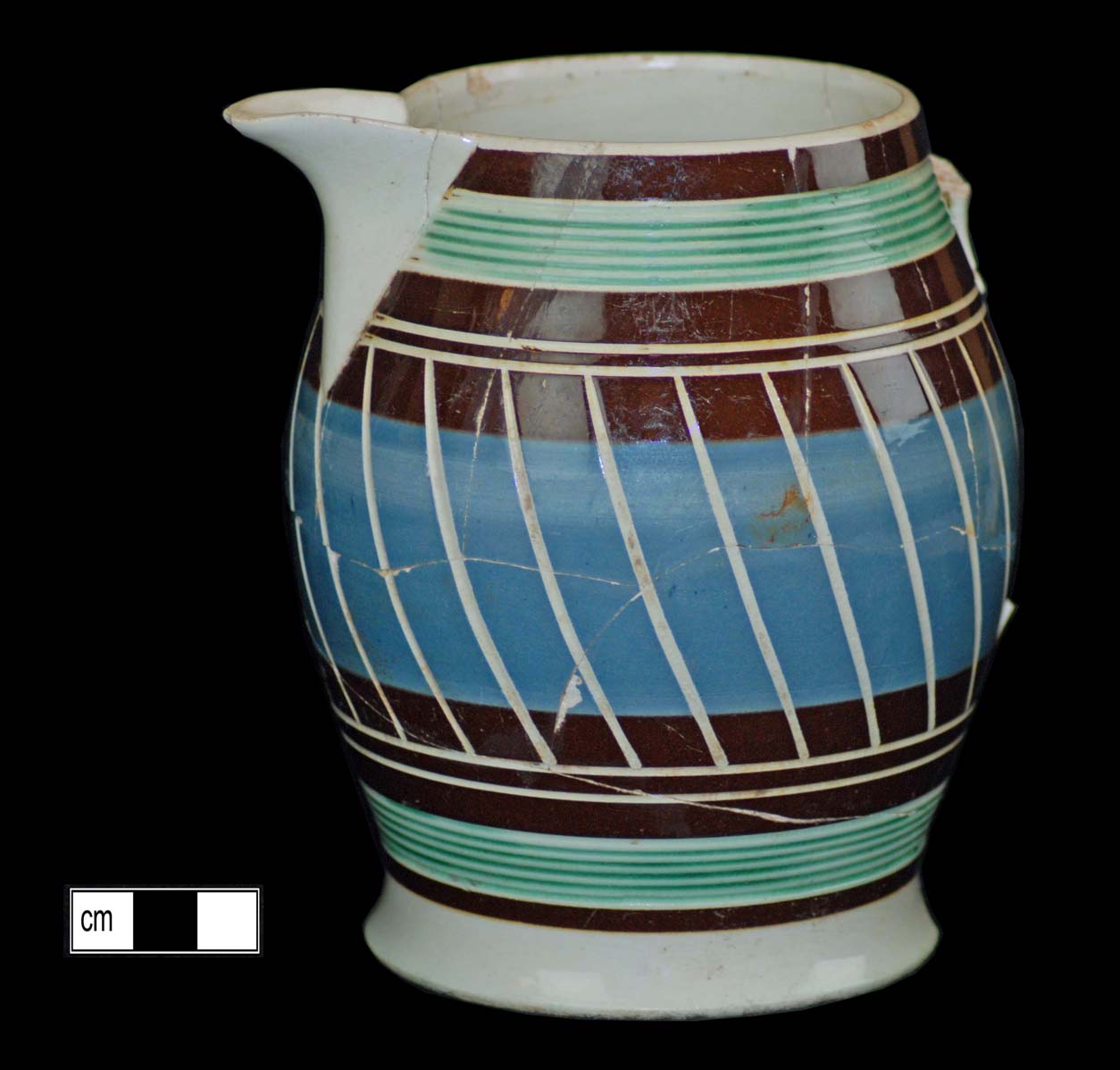 Image of dipped earthenware fragment.