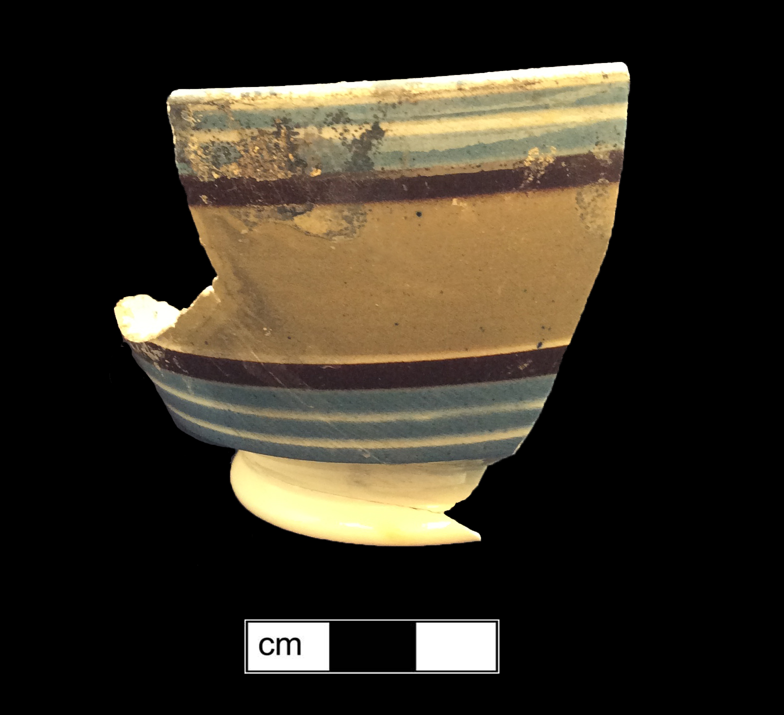 Image of dipped earthenware fragment.