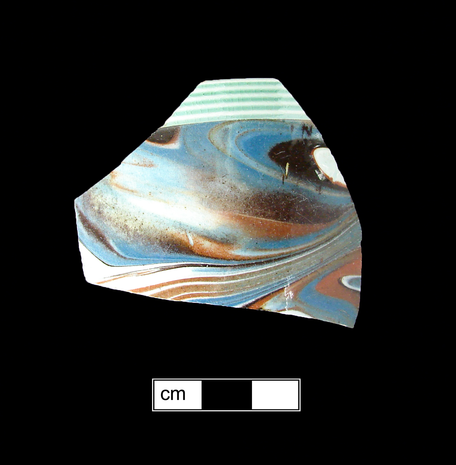 Image of dipped earthenware fragment.