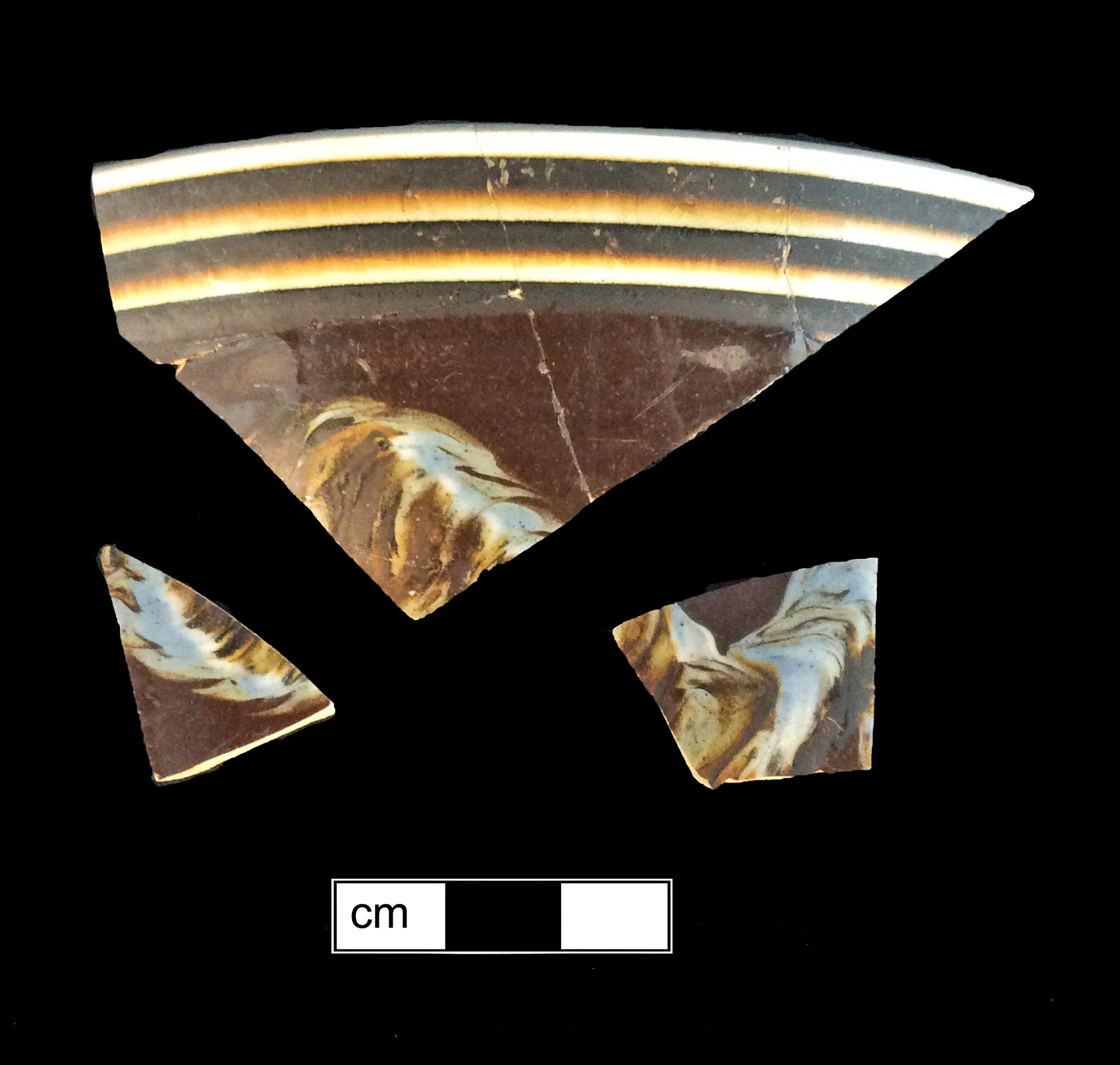 Image of dipped earthenware fragment.