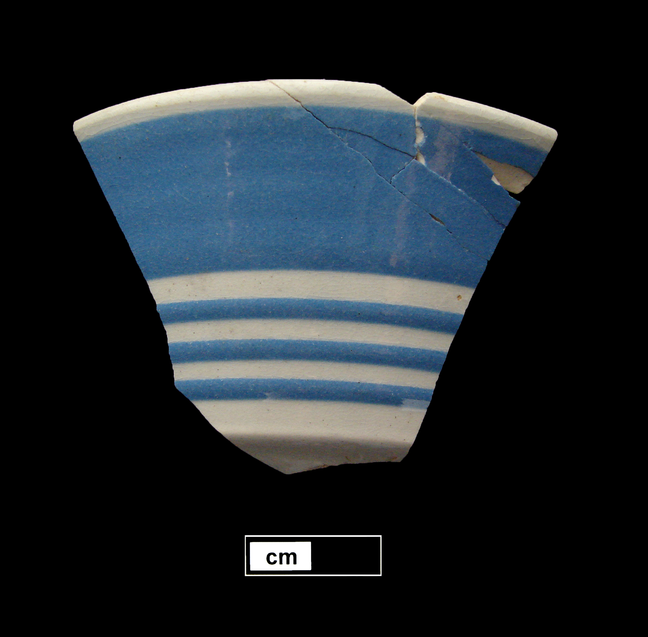 Image of dipped earthenware fragment.