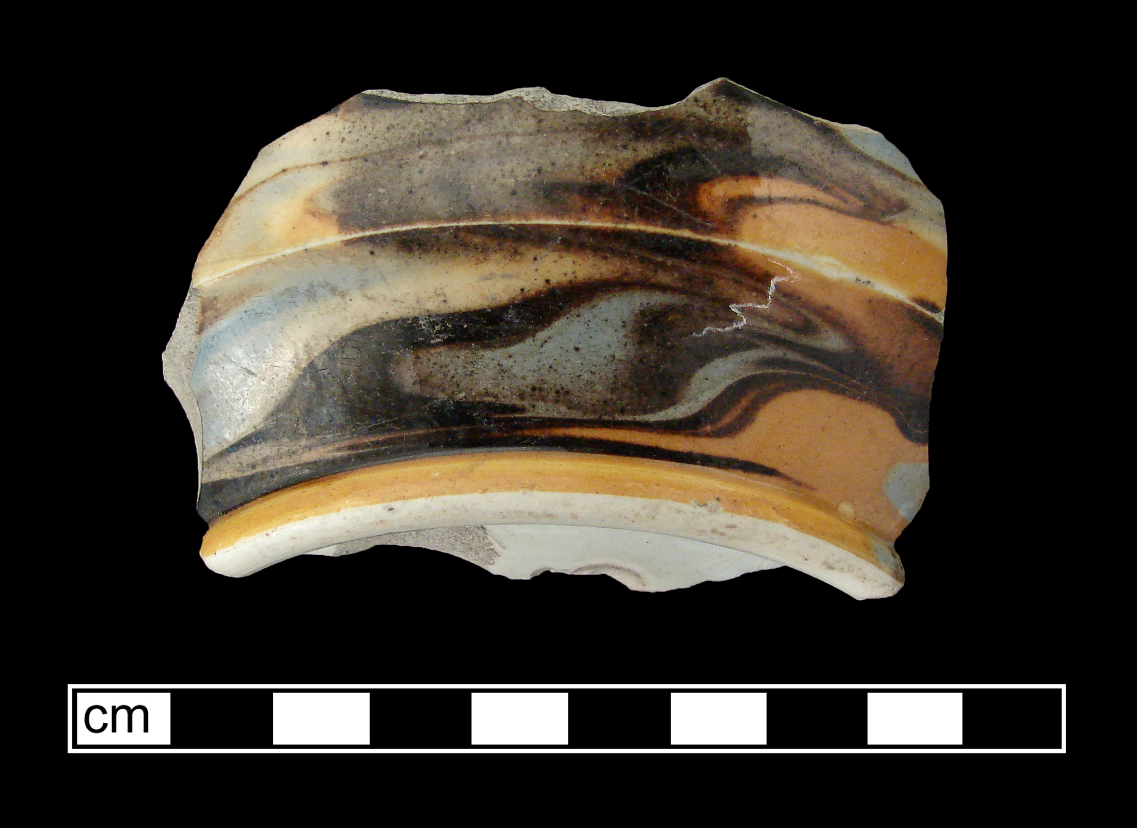 Image of dipped earthenware fragment.