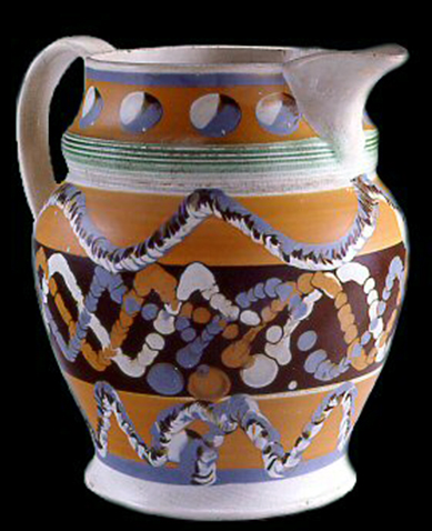 Image of dipped earthenware fragment.