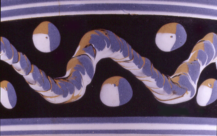 Image of dipped earthenware fragment.