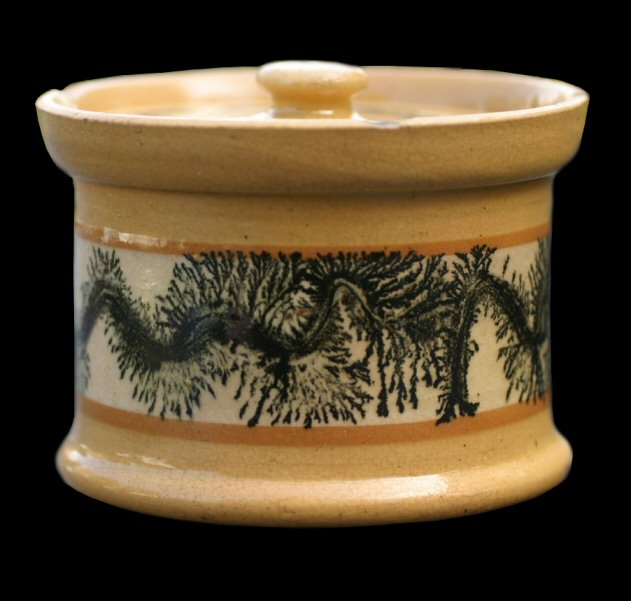 Image of dipped earthenware fragment.