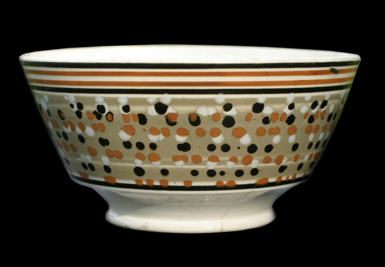Image of dipped earthenware fragment.