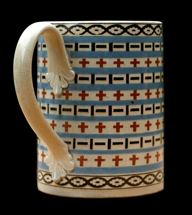 Image of dipped earthenware fragment.