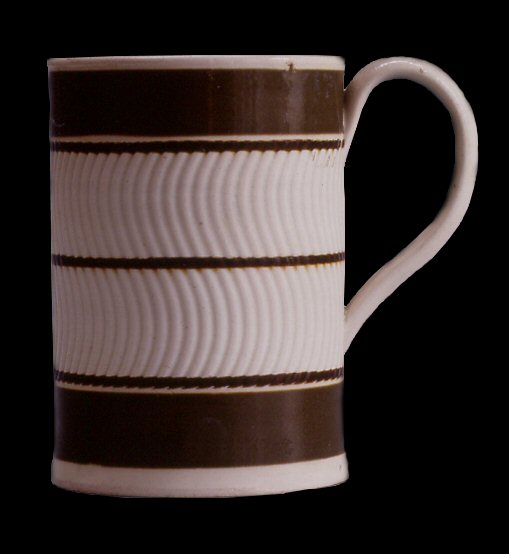 Image of dipped earthenware fragment.