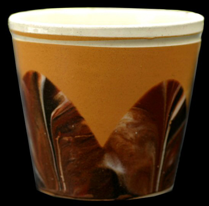Image of dipped earthenware fragment.
