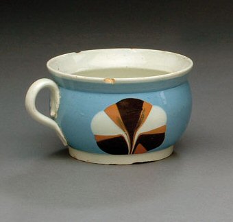 Image of dipped earthenware fragment.