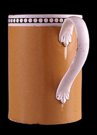 Image of dipped earthenware fragment.