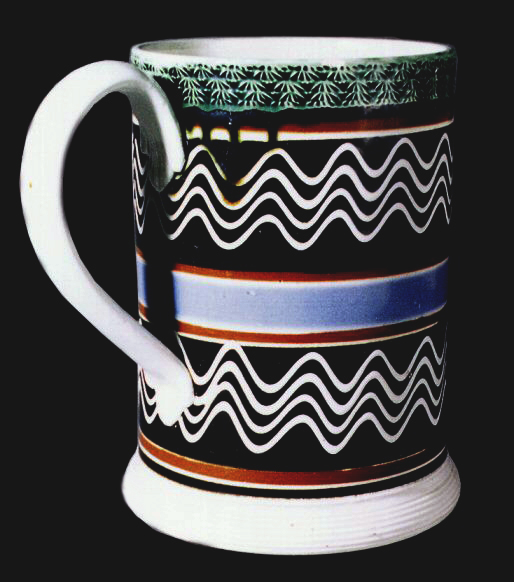 Image of dipped earthenware fragment.