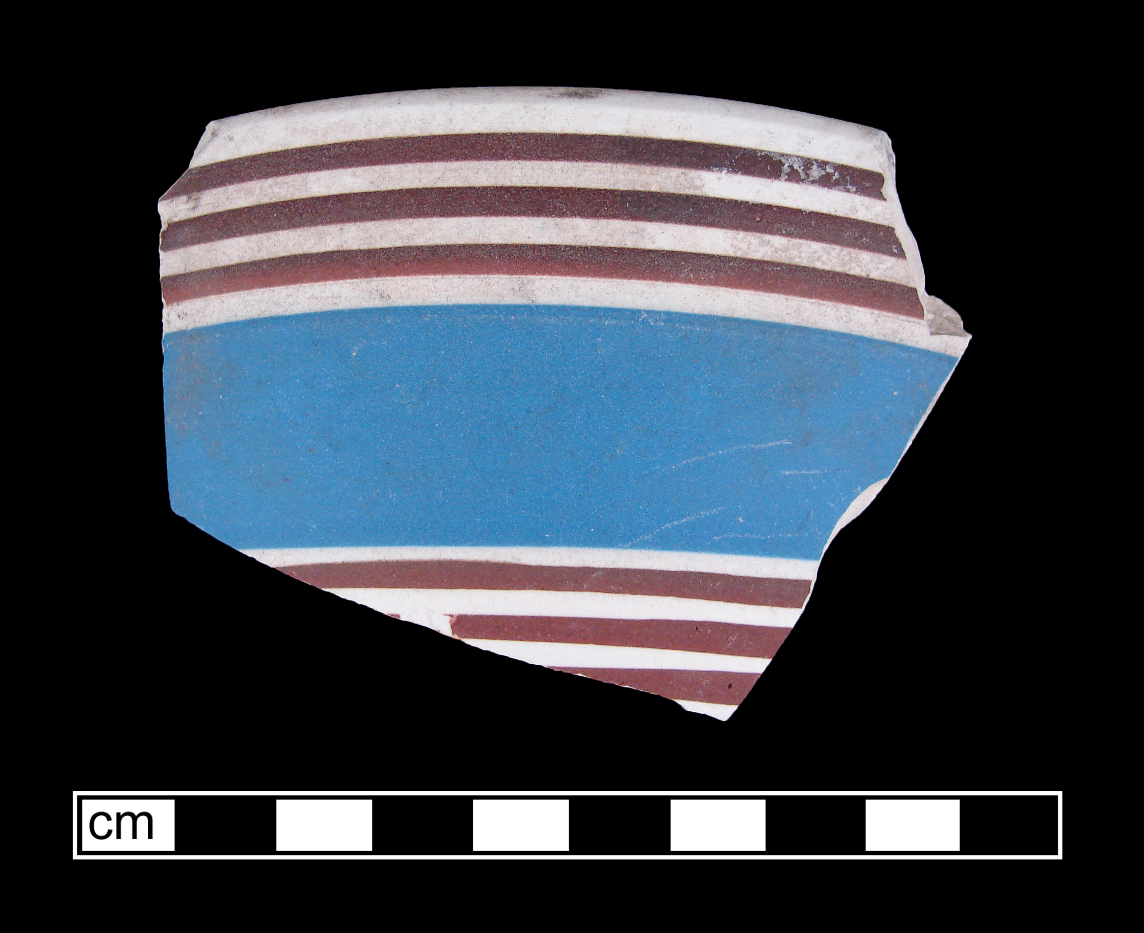 Image of dipped earthenware fragment.