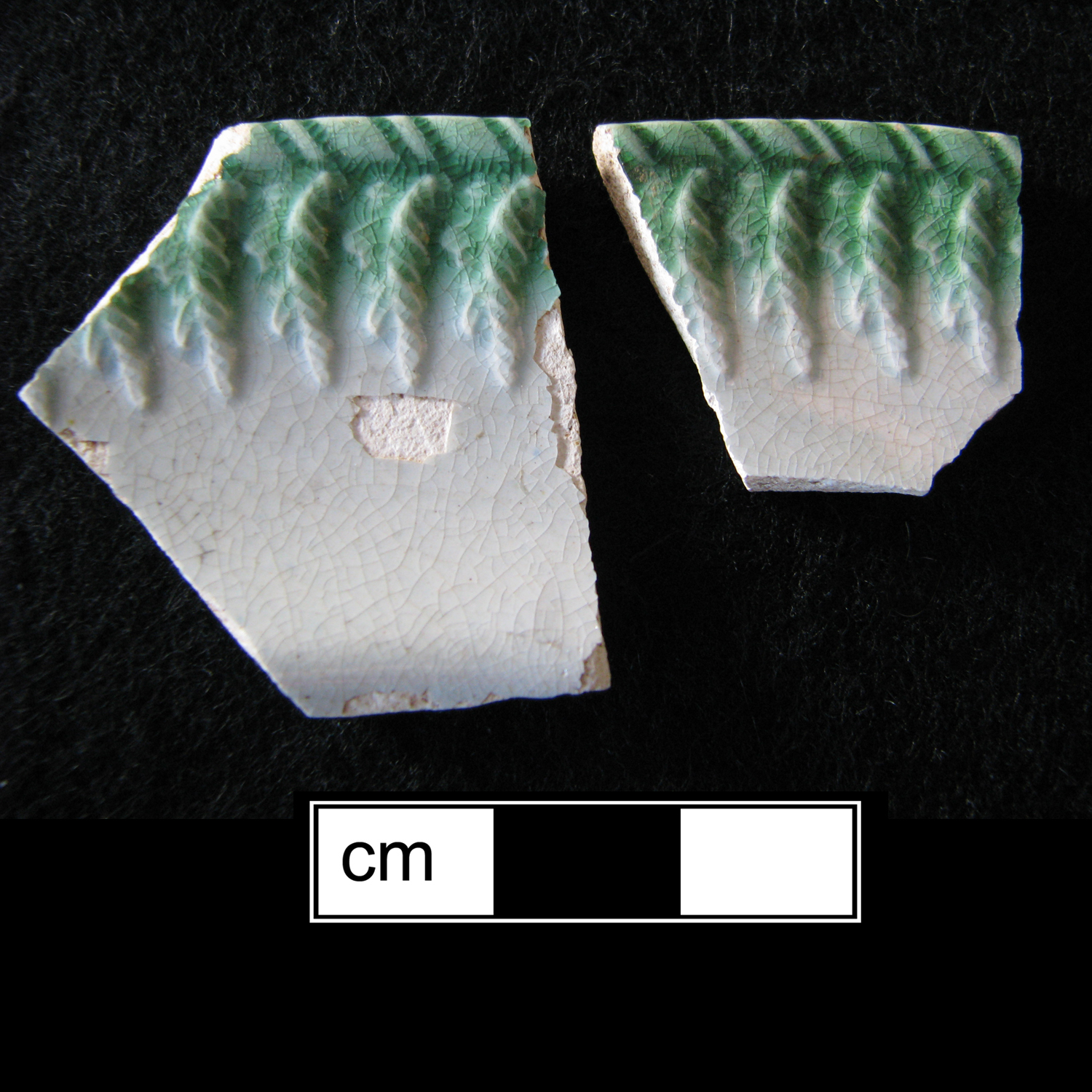 Image of edged earthenware fragment.