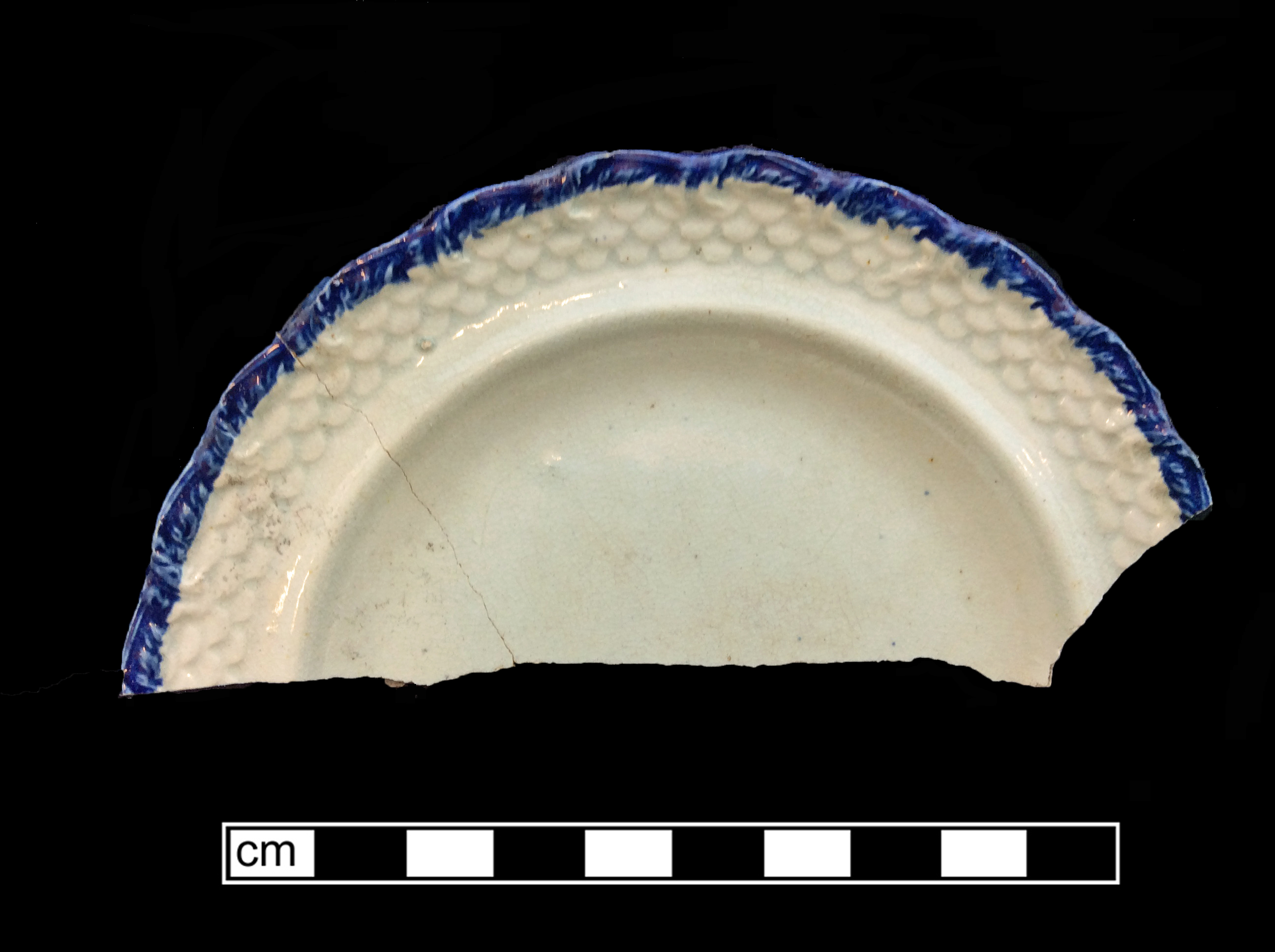 Image of edged earthenware fragment.