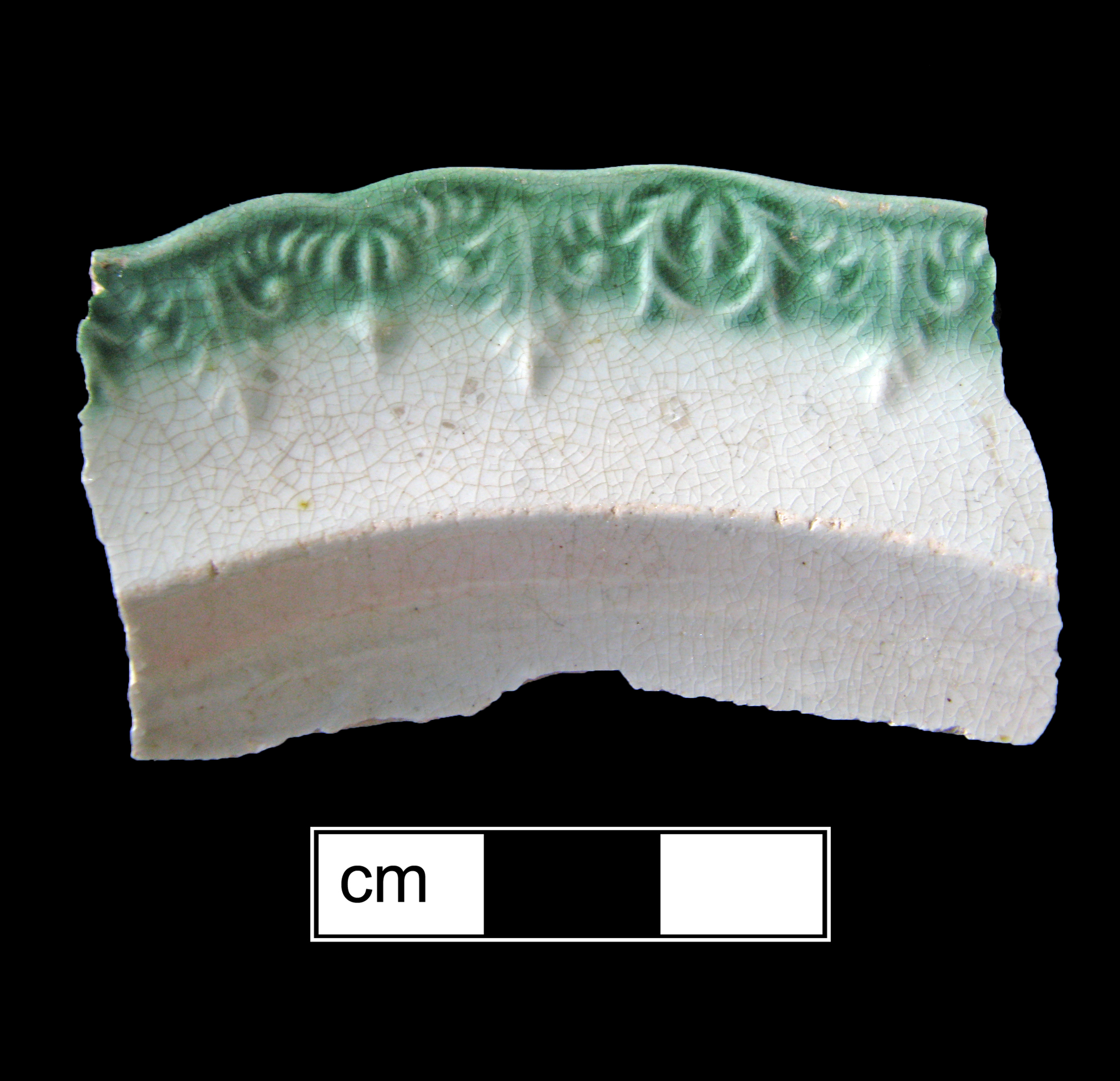 Image of edged earthenware fragment.