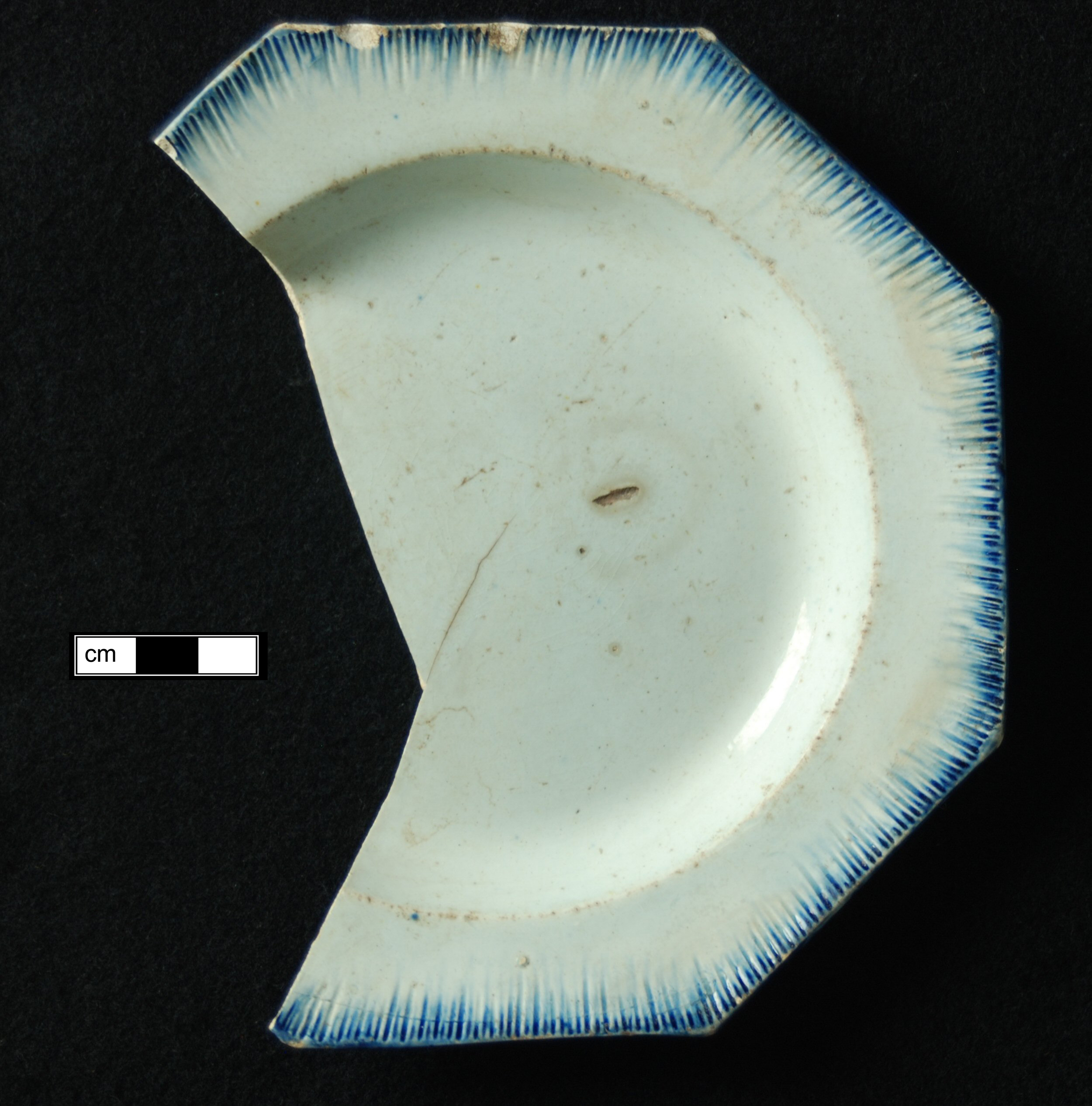 Image of edged earthenware fragment.