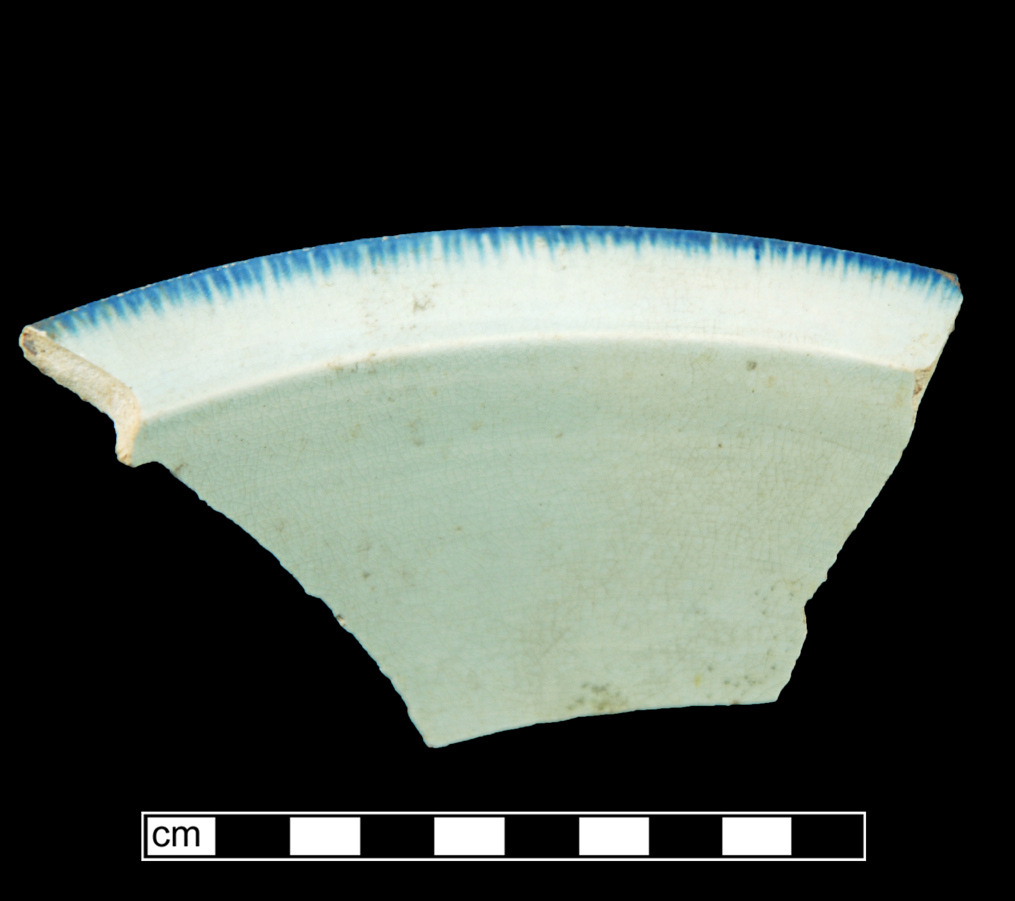 Image of edged earthenware fragment.